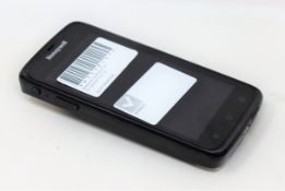 A pre-owned Honeywell Scanpal EDA50-111-C121NGO Hand Held Computer/Barcode Scanner (Missing