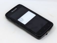 A pre-owned Honeywell Scanpal EDA50-111-C121NGO Hand Held Computer/Barcode Scanner (Missing