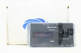 A boxed as new Creston 4 port HDMI distribution amplifier (PN: HD-MD4X1-4K-E) (Box damaged).