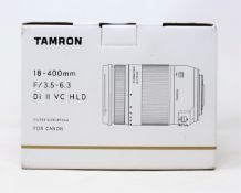 A boxed as new Tamron 18-400mm f/3.5-6.3 Di II VC HLD Lens for Canon EF Mounts.