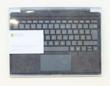 A boxed as new Microsoft Surface Pro Signature Type Cover in Alcantara Charcoal (FFQ-00143 Model: