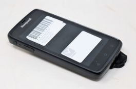 A pre-owned Honeywell Scanpal EDA50-111-C121NGO Hand Held Computer/Barcode Scanner (Missing
