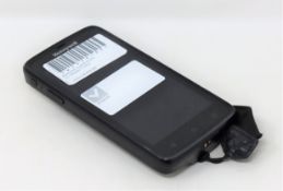 A pre-owned Honeywell Scanpal EDA50-111-C121NGO Hand Held Computer/Barcode Scanner (Missing