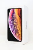 A pre-owned Apple iPhone Xs (Global/A2097) 64GB in Gold (iCloud activation clear. Scratches to