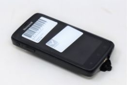 A pre-owned Honeywell Scanpal EDA50-111-C121NGO Hand Held Computer/Barcode Scanner (Missing
