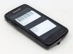 A pre-owned Honeywell Scanpal EDA50-111-C121NGO Hand Held Computer/Barcode Scanner (Missing