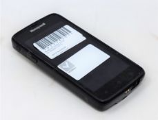 A pre-owned Honeywell Scanpal EDA50-111-C121NGO Hand Held Computer/Barcode Scanner (Missing