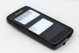 A pre-owned Honeywell Scanpal EDA50-111-C121NGO Hand Held Computer/Barcode Scanner (Missing