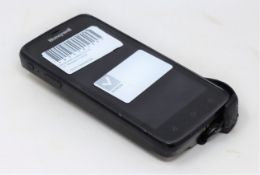 A pre-owned Honeywell Scanpal EDA50-111-C121NGO Hand Held Computer/Barcode Scanner (Missing