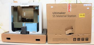 A boxed as new Ultimaker S5 3D printer and a boxed as new Ultimaker S5 Material Station (box opened)
