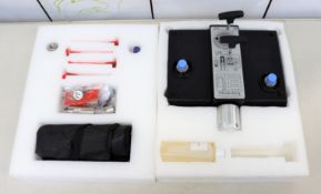 A pre-owned Budenburg BGH1200 Hydraulic Dead Weight Tester Base unit with parts and tools (Item does