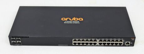 Two pre-owned HP Aruba 2930F (JL259A) 24-Port managed switches in black.