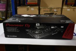 A boxed as new Pioneer XDJ-RX2 DJ controller.