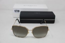 A pair of as new Givenchy sunglasses.