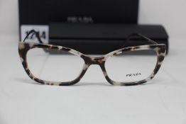 A pair of as new Prada glasses frames.