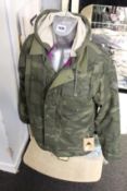 A men's as new Burton Dunmore jacket (S - RR P£180).