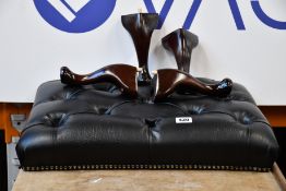 A Chesterfield Stools black leather footstool.