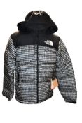 An as new Supreme X The North Face The Studded Neptse jacket (M).