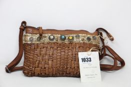 An as new Karma of Charme Dream Sling bag (RRP €180).