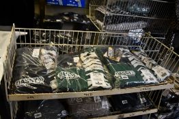 Four Dassy Cannes two-tone overalls with knee pockets in bottle green and black (S) and one in black