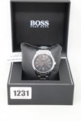 An as new Hugo Boss Circuit watch.