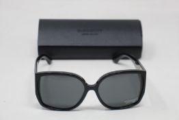 A pair of as new Burberry sunglasses.