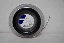 An as new Babolat RPM Blast 200m Tennis String Reel in black (130/16).