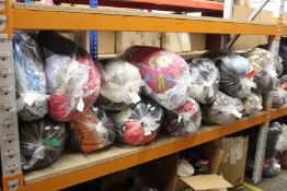 Thirteen bags of pre-owned clothing and related items.