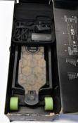 A pre-owned Evolve GTR carbon series all terrain electric skateboard (Viewing advised).