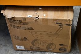 An EarthWay EV-N-SPRED Flex Select F80 Salt Spreader.