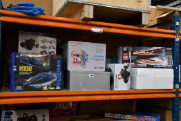 A quantity of assorted remote control vehicles to include speed boat, 4 x 4 jeeps, off road buggy'