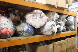 Eleven bags of pre-owned clothing and related items.