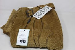 A pair of as new Loewe corduroy trousers in beige (EU 52 - RRP £875).