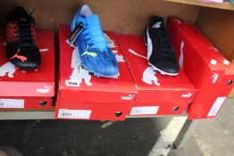 Four pairs of as new Puma football boots; Ultra 3.2 (UK 12), Tacto (UK 8) and two pairs of