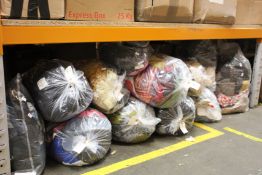 Twelve bags of pre-owned clothing and related items.