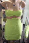 An as new David Koma linear mesh midriff mini dress in neon yellow (UK 8).