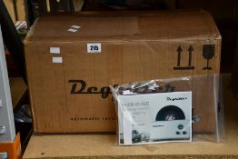 A Degritter Automatic Record Cleaning Machine.