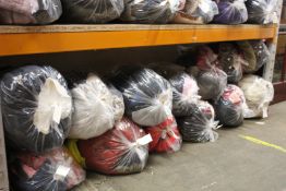 Thirteen bags of pre-owned clothing and related items.