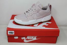 A pair of women's as new Nike Dunk Low Disrupt trainers (UK 6.5).
