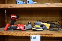 A Milwaukee M18 CAG115XPDB angle grinder and an M18 FID2 Impact Driver (Both unit only), along