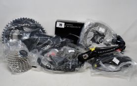 An as new Shimano R8000 Ultegra 11 Speed Road Bike Groupset comprising ST-R-8020 STi brake/shifter