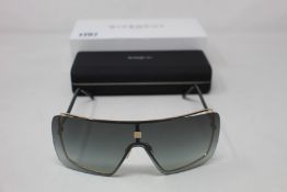 A pair of as new Givenchy sunglasses.