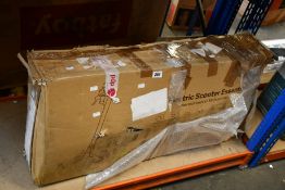 A pre-owned Razor Powercore E100 electric scooter (Item is untested and may be incomplete).