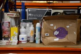 A miscellaneous assortment of scented candles, wax melts, essential oils and related items to