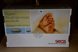 A Seca Lena 354 Digital Baby Scale.