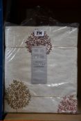 Two pairs of John Lewis & Partners Pencil Pleat Curtains with a mini olive tree design (RRP: £100).