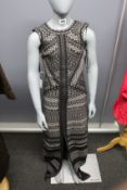 An as new Herve Leger dress in black/comb (XXS).