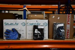 Two boxes of sports fitness bands and a box of pet shedding gloves.