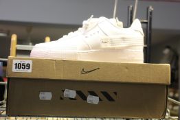 A pair of as new Nike AF1-Type (UK 7).