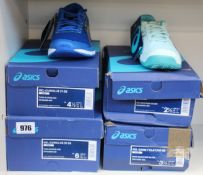 Four pairs of children's as new Asics trainers; two pairs of Gel-Cumulus 21 (UK 3.5, 5) and two